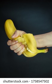 woman-holding-banana-her-hand-260nw-1758547502.jpg